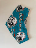 Fins and Fetch reversible pet bandana teal football helmet print side